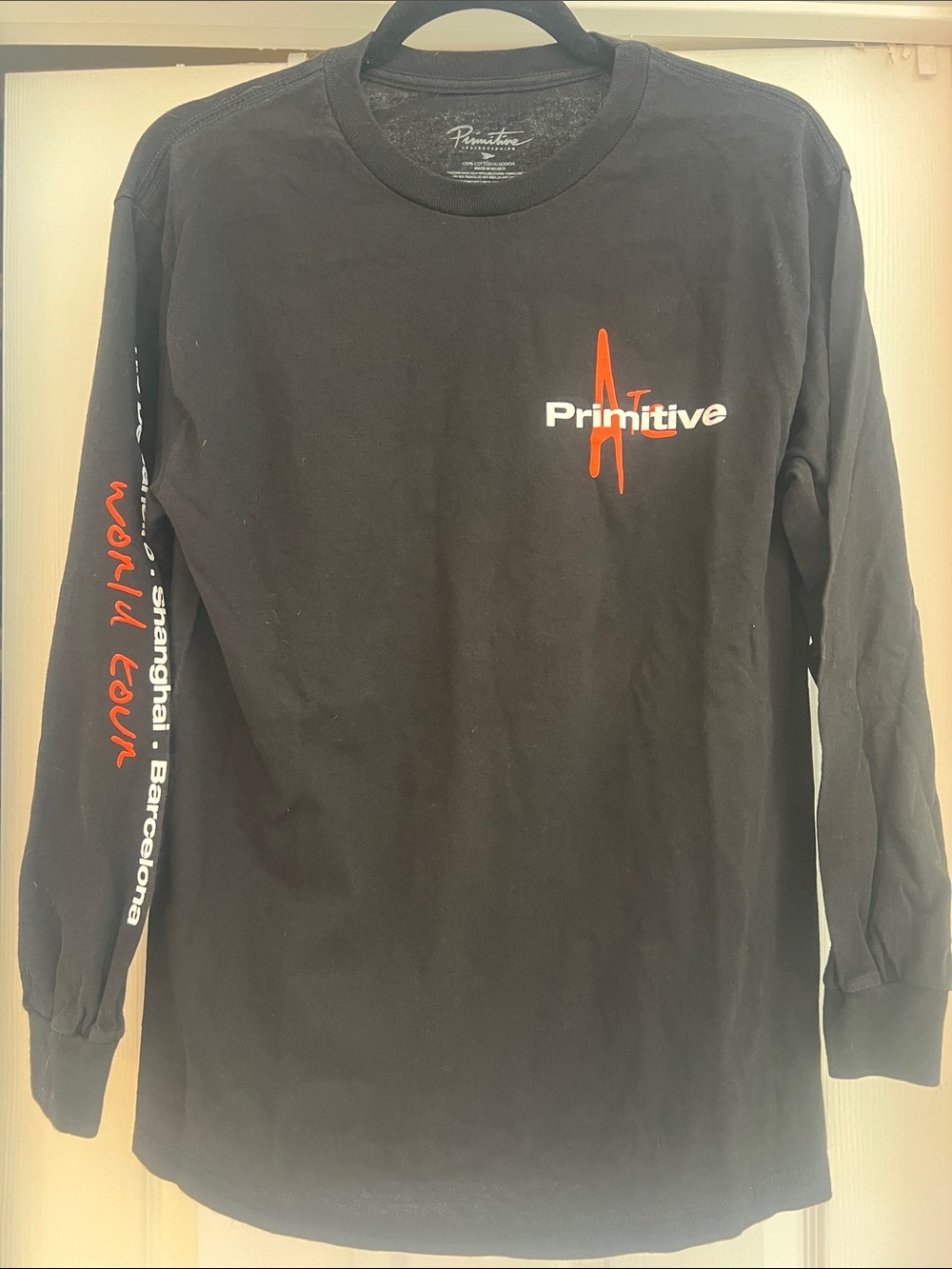 Primitive Black Long Sleeve Tee with Red Logo